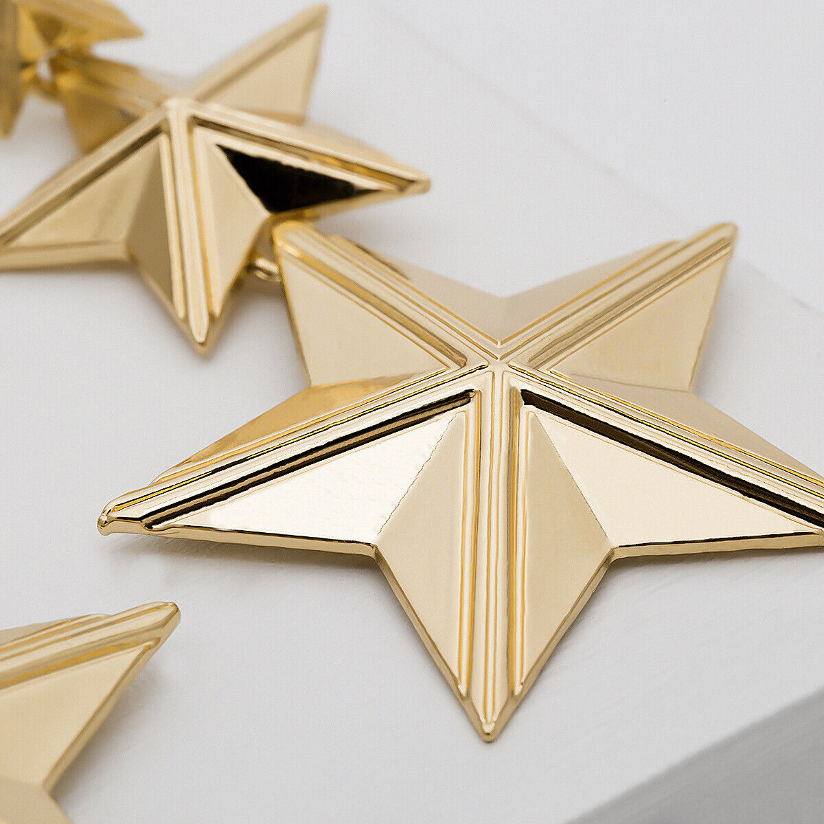 Gold Plated Stars Dangle Earrings