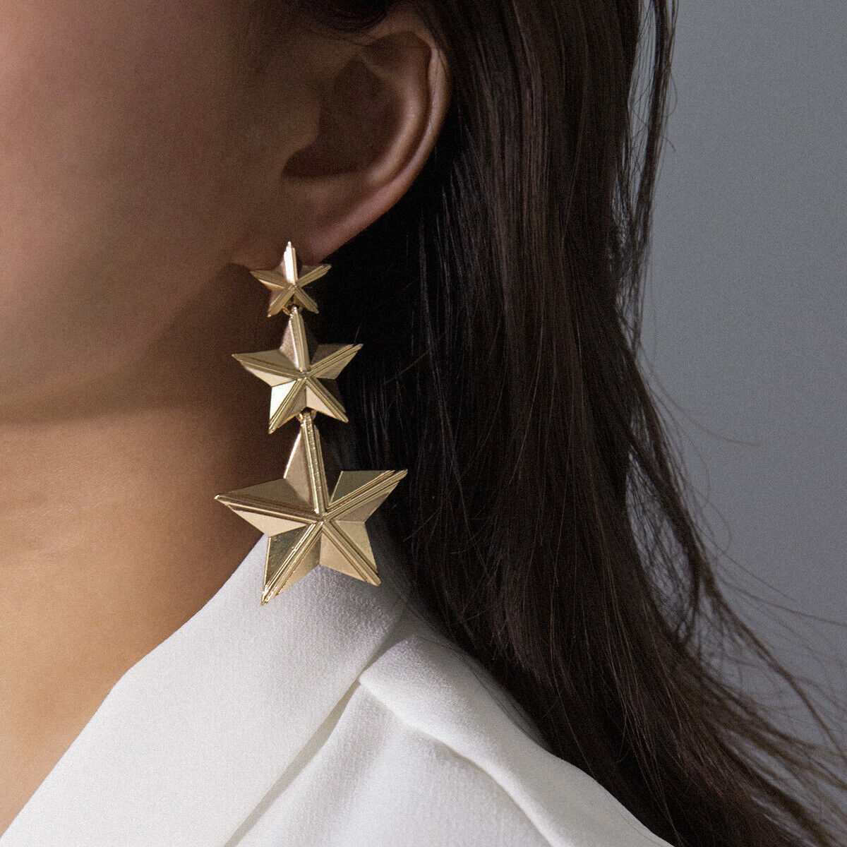 Gold Plated Stars Dangle Earrings